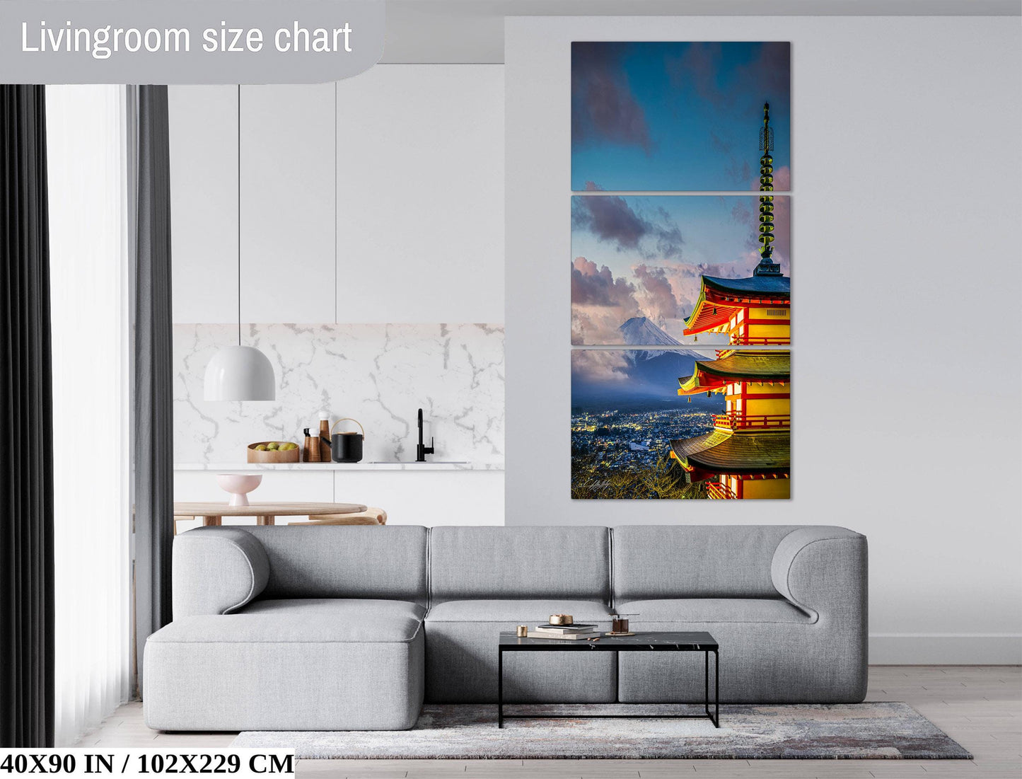 a modern living room with a gray sofa, a coffee table, and a large wall art piece depicting a Japanese pagoda against a city skyline.