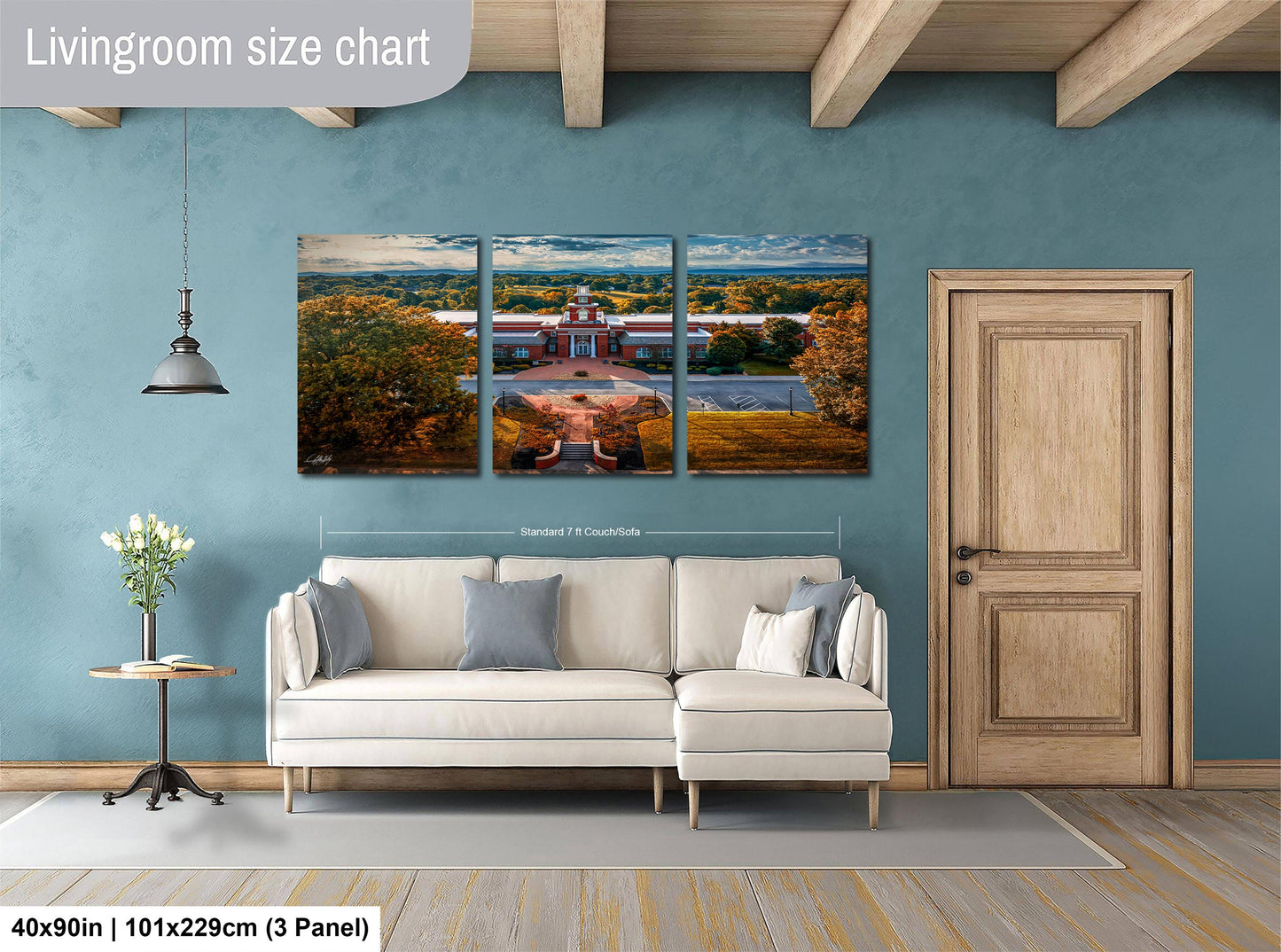 The image is a living room with a large, three-panel living room size chart on the wall. The chart displays the dimensions of the living room in feet and inches, with the largest panel being 40'x90'', the medium panel being 101'x129'', and the smallest panel being 103'x229''.