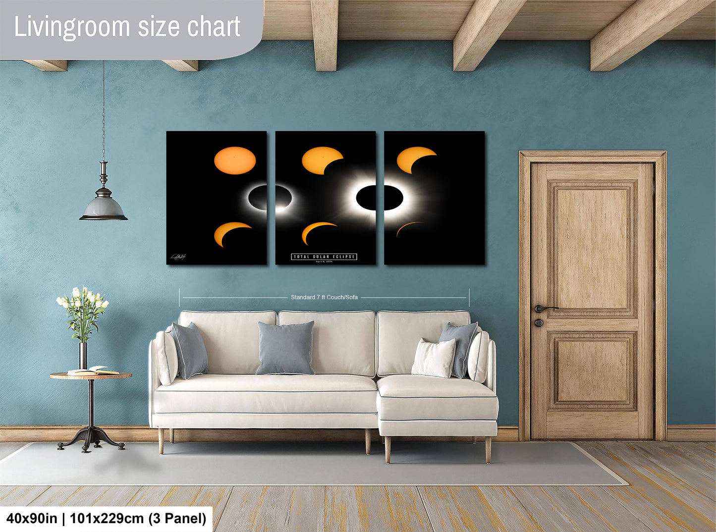 The image is a livingroom size chart that includes a large wall art depicting the solar eclipse, a white sofa, a wooden door, and a small table with a vase of flowers.