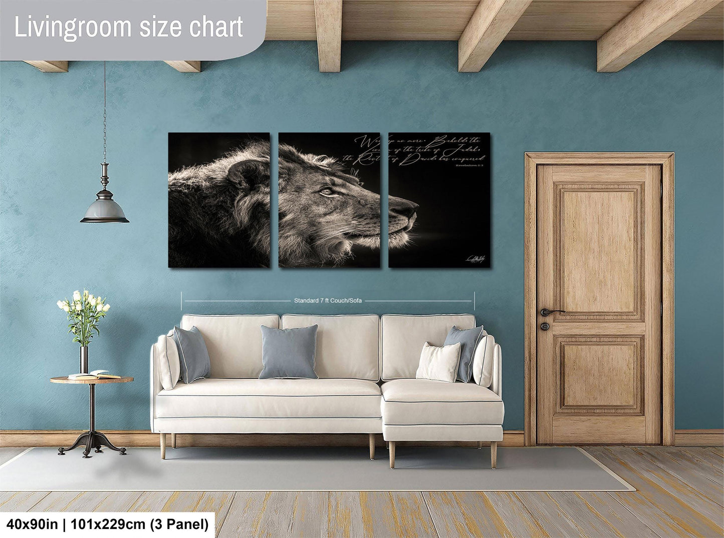 The image is a living room with a large wall art piece depicting a lion's head. The living room has a white sofa, a wooden door, and a wooden floor. The wall art is approximately 40 inches wide and 101.29 cm tall, with a 3-panel layout.