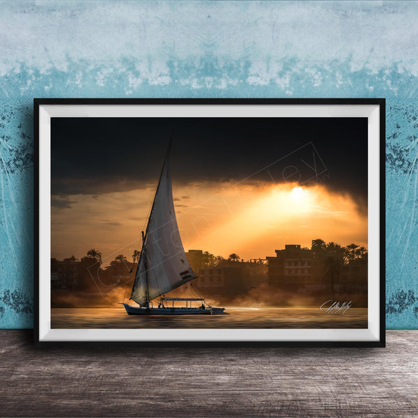 felucca sailboat art, nile river sunset print, luxor egypt fine art, egypt river photography, luxury travel wall art, serene river landscape, egyptian culture artwork, nile boat photography, sunset fine art print, timeless travel decor, historic river wall art, luxury collector photography, egypt fine art print, calming interior artwork