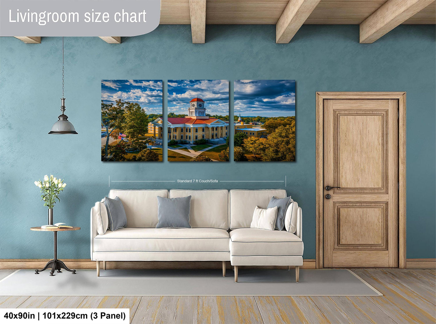 The image is a living room with a large, three-panel living room size chart on the wall. The chart displays the dimensions of the living room in feet and inches, with the largest panel being 40'x50'', the medium panel being 101'x129'', and the smallest panel being 103'x229''.