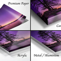The image is a collage of four different views of a sunset landscape, each with a different material or finish. The text labels the images as "Premium Paper", "Canvas Wrap", "Acrylic", and "Metal/Aluminum".