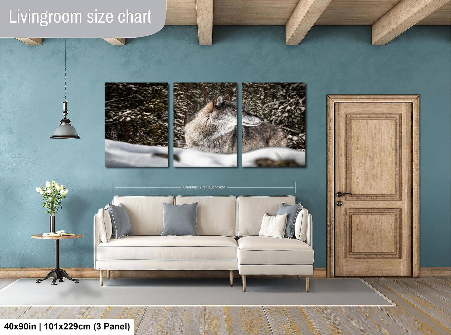 The image is a living room with a large white sofa, a wooden door, and a painting of a wolf in the background.
