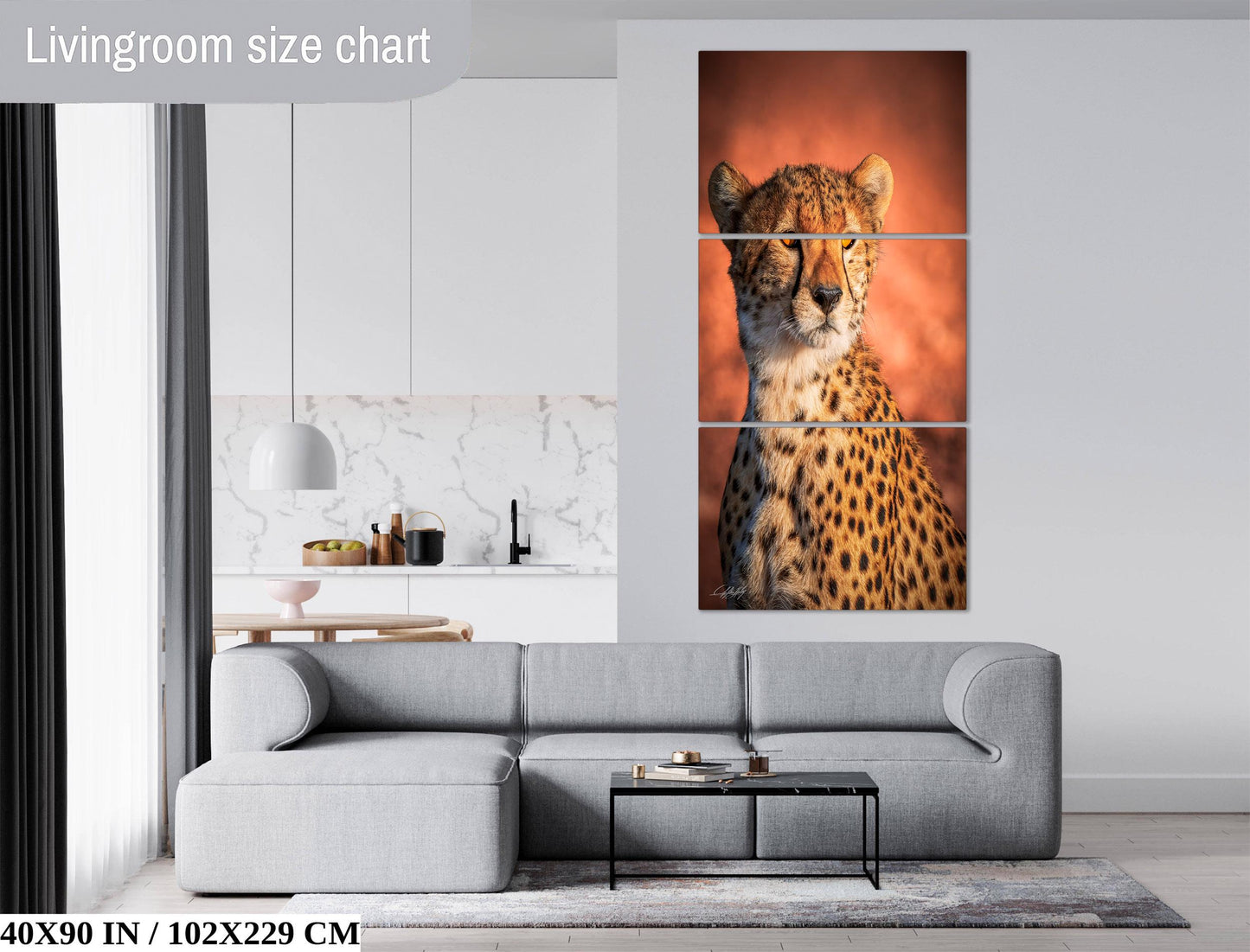 a living room with a gray sofa, a coffee table, and a large wall art featuring a cheetah.