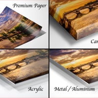 The image is a collage of four different images, each depicting a sunset over a bridge. The images are labeled as "Premium Paper", "Canvas Wrap", "Acrylic", and "Metal/Aluminum".