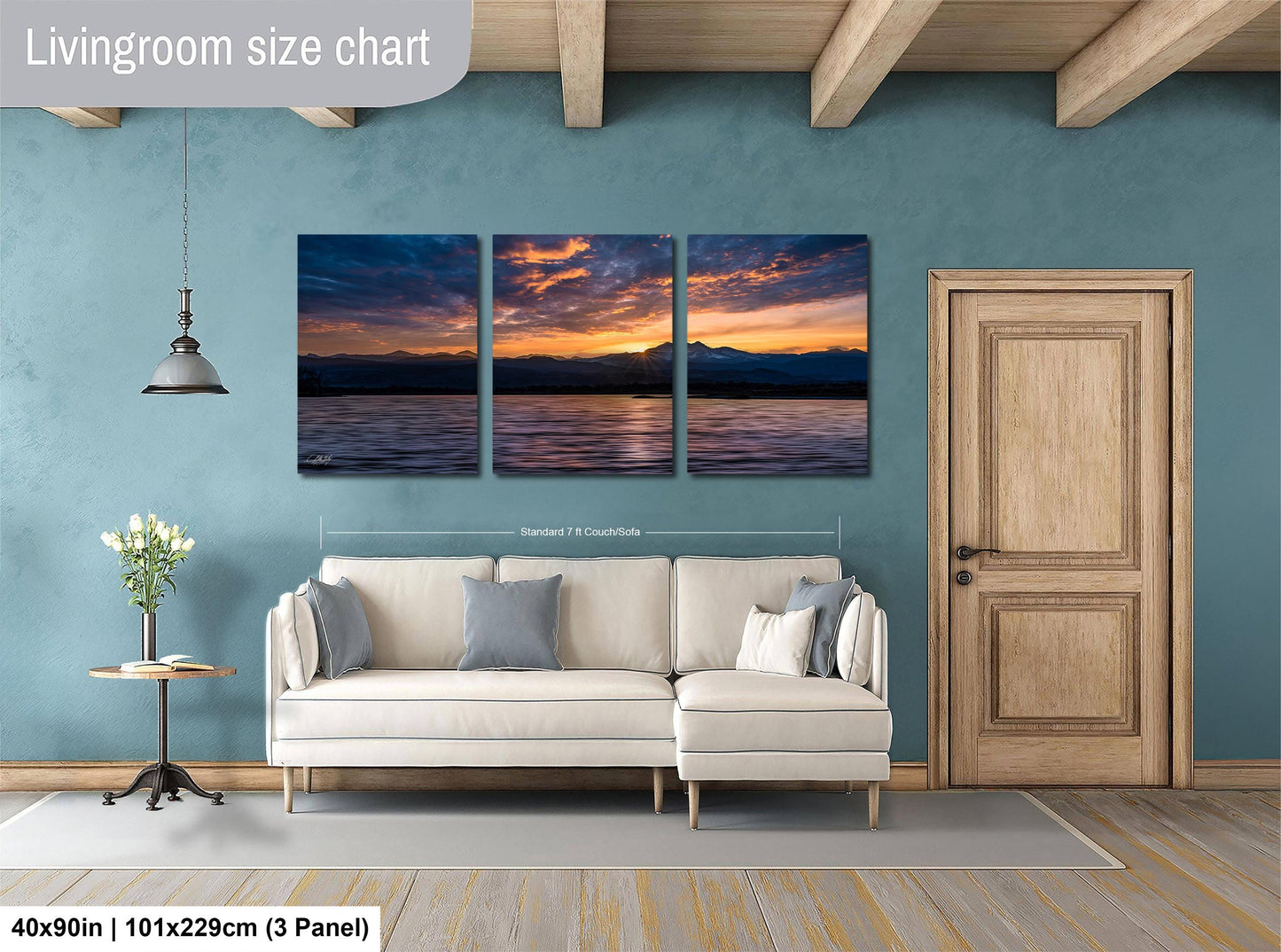 a living room with a couch and a painting on the wall