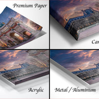 The image is a collage of four photos depicting a sunset over a cityscape, with the text "Premium Paper", "Canvas Wrap", "Acrylic", and "Metal/Aluminum" indicating the materials used for the prints.
