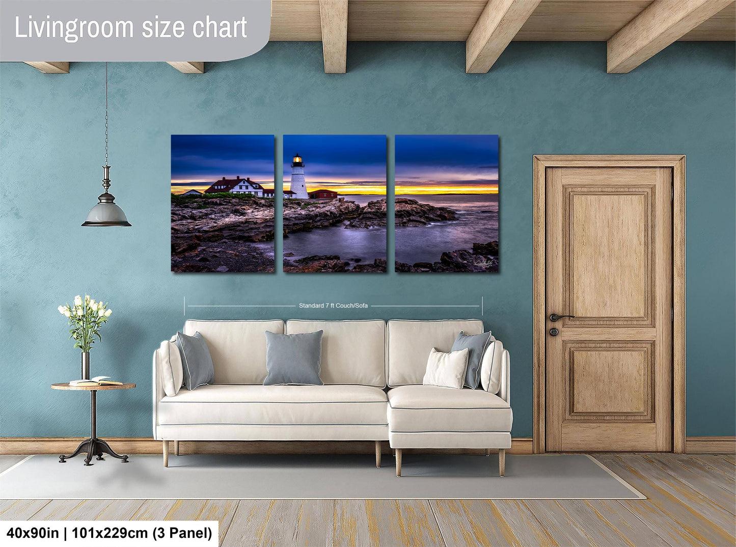 The image is a livingroom with a large wall art depicting a lighthouse at sunset. The wall art is divided into three panels, each showing a different part of the lighthouse and the surrounding landscape. The livingroom has a white sofa and a wooden door, creating a cozy and inviting atmosphere.