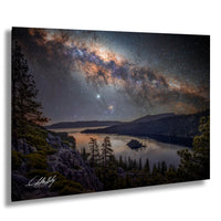 a breathtaking night sky over a serene lake, with a stunning view of the Milky Way galaxy stretching across the frame.