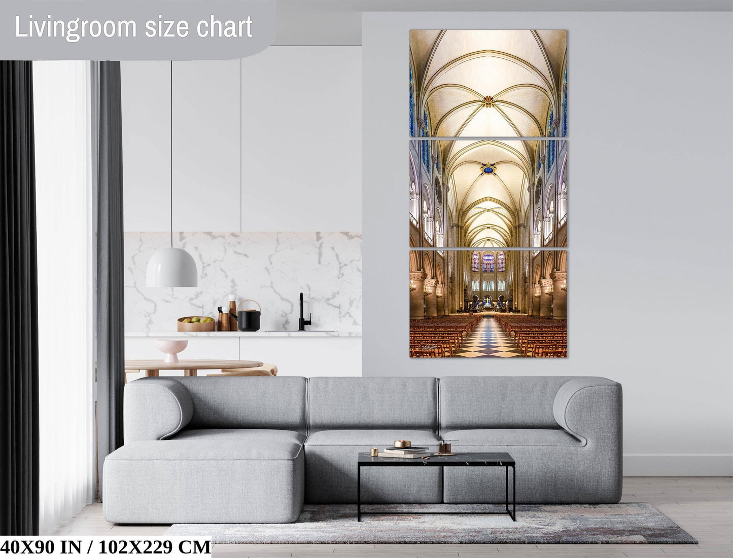 The image is a living room with a gray sofa, a coffee table, and a large painting of a cathedral's interior on the wall.