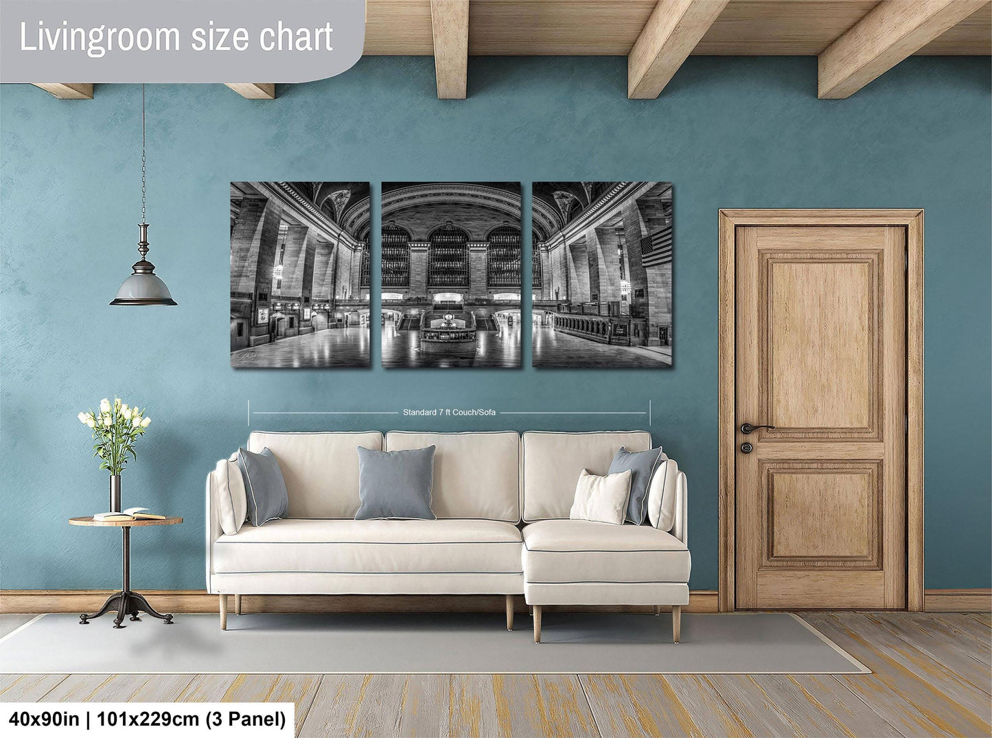 The image is a living room with a large, three-panel living room size chart on the wall. The chart provides dimensions for the living room, including the width and height. The living room is furnished with a white sofa and a wooden door, and there is a vase of flowers on a table nearby.