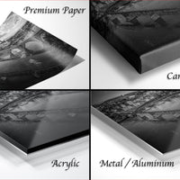 four different views of a black and white photograph of a cityscape, with the text "Premium Paper", "Canvas Wrap", "Acrylic", and "Metal/Aluminum" indicating the materials used to print the image.