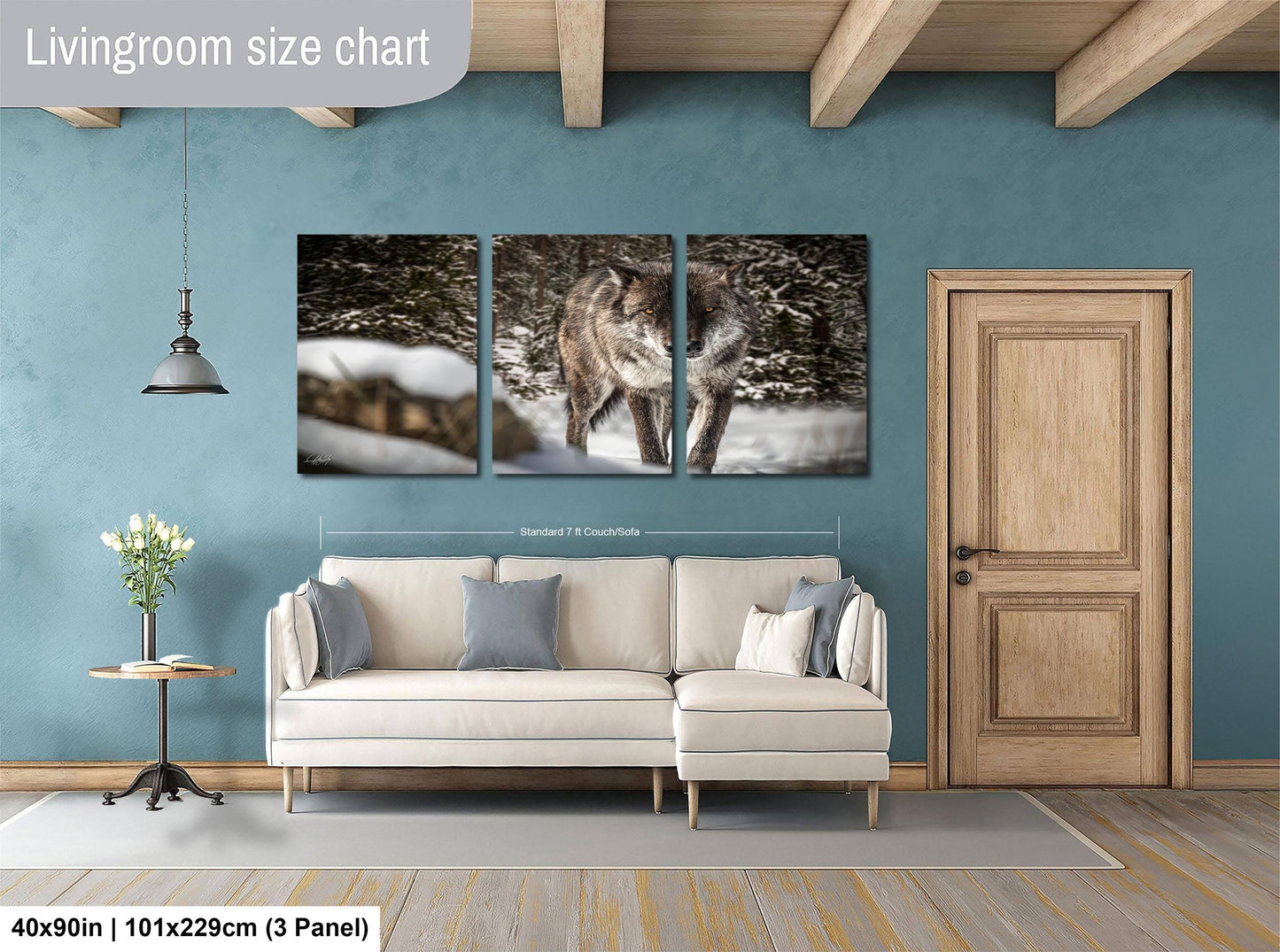 The image is a living room with a large white sofa, a wooden door, and a painting of a wolf in the background.