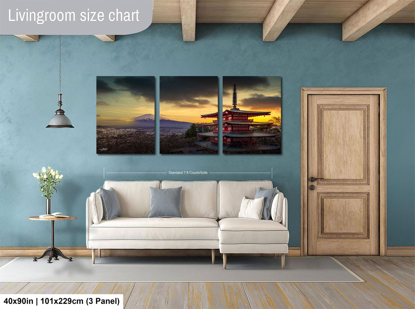 The image is a living room with a large, three-panel living room size chart on the wall. The chart displays the dimensions of the living room in feet and inches, with the largest panel indicating the dimensions of the room. The living room is furnished with a white sofa and a wooden door, and there is a vase of flowers on a table nearby.