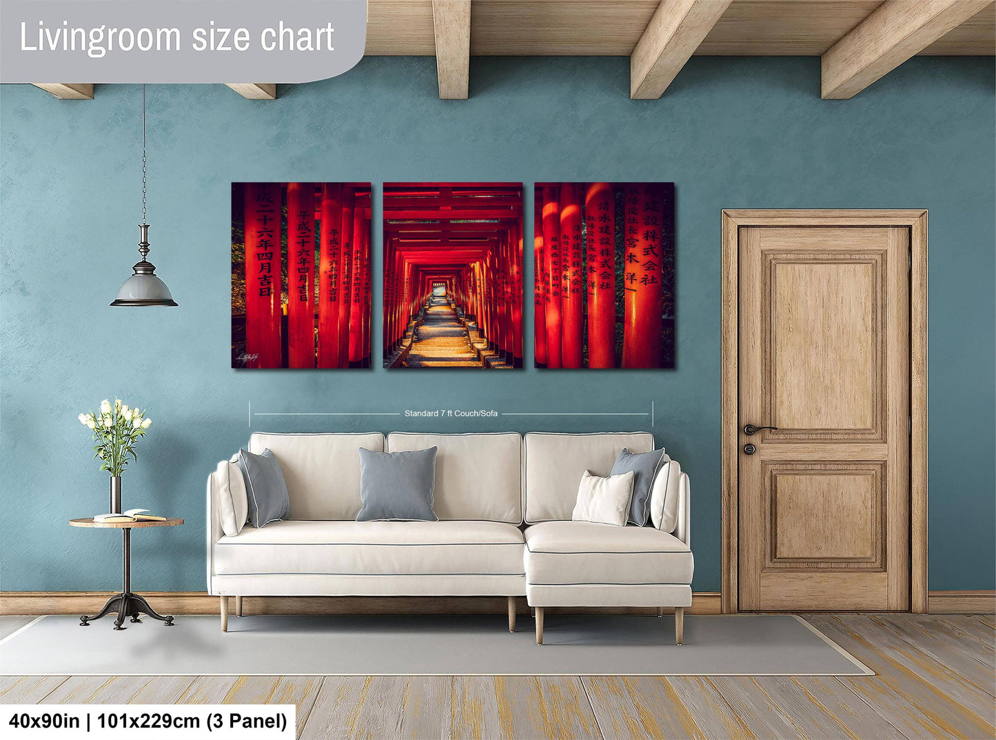 The image is a living room with a white sofa, a wooden door, and a large wall art depicting a red hallway with a yellow light at the end.