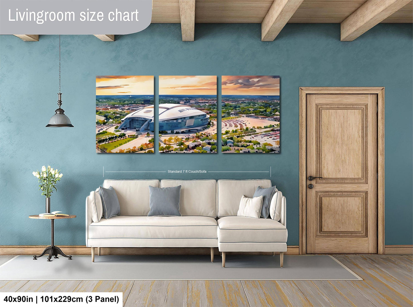 The image is a living room with a large wall art depicting a stadium or arena. The wall art is divided into three panels, each showing different parts of the stadium or arena. The living room has a white sofa and a wooden door, and there is a potted plant and a vase on a table nearby. The wall art is approximately 40 inches wide and 101.29 cm tall, and it is mounted on a blue wall.