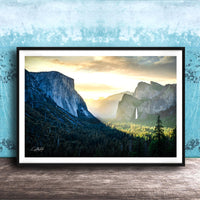 The image is a framed photograph of a scenic mountain landscape with a waterfall, set against a blue and white background.