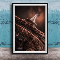 a close-up view of the Eiffel Tower, showcasing its intricate metal lattice structure and the surrounding night sky.