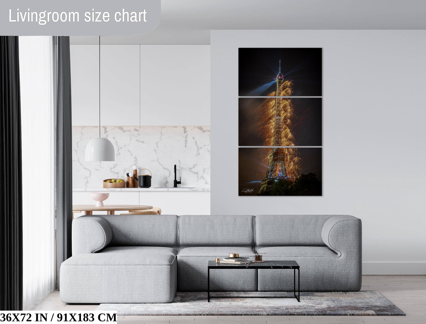 a living room with a couch and a painting on the wall