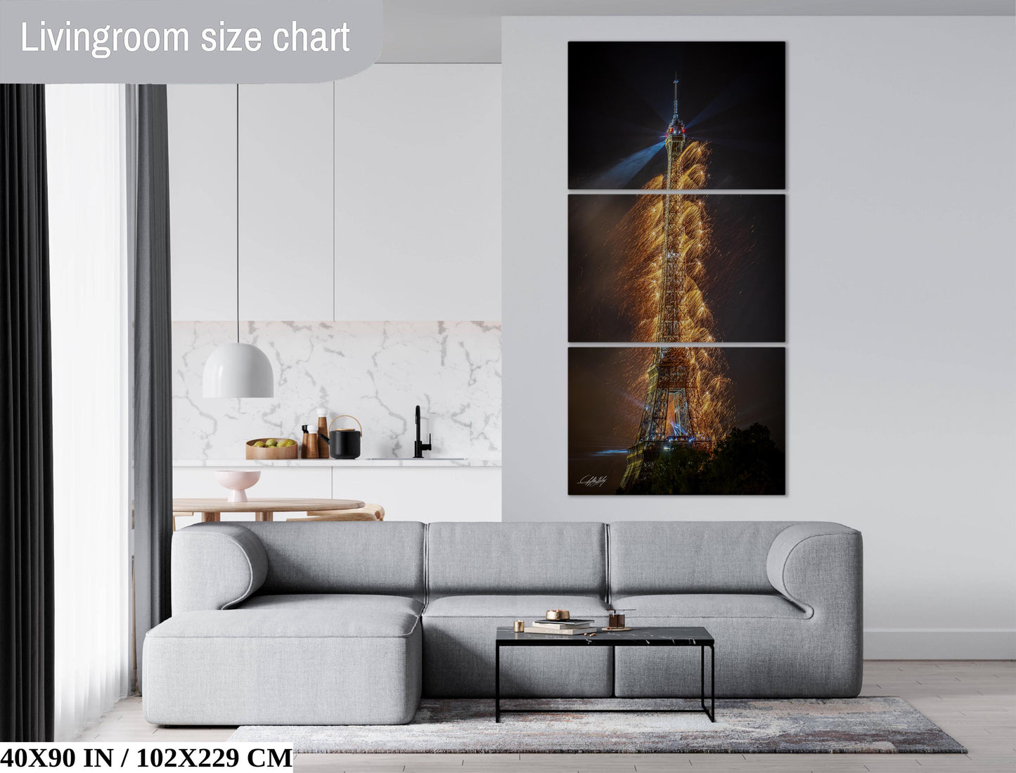 a living room with a couch and a painting on the wall