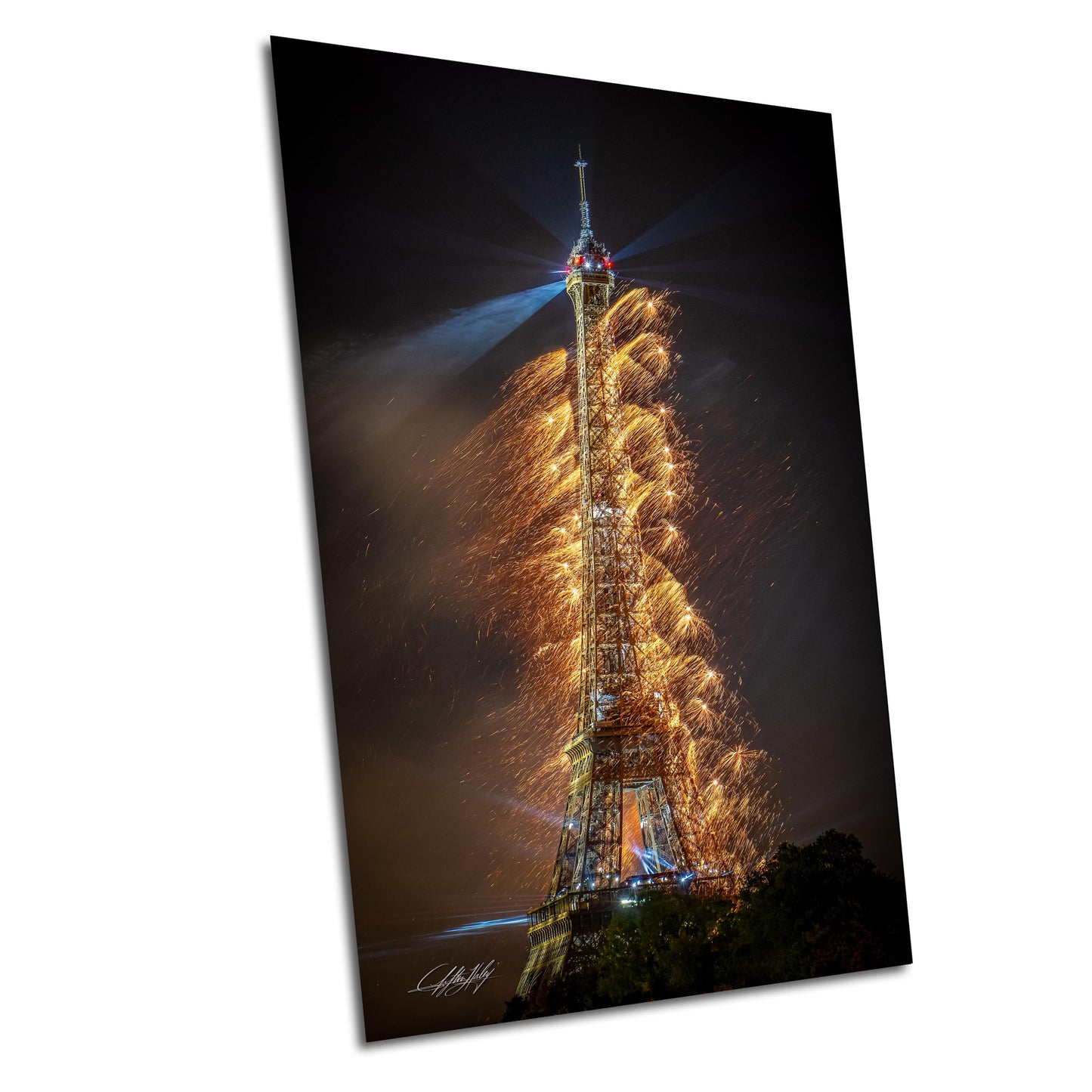 a picture of the eiffel tower lit up at night