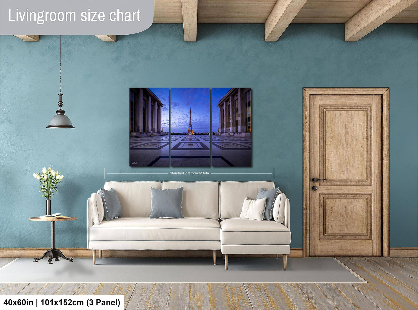 a living room with blue walls and a white couch