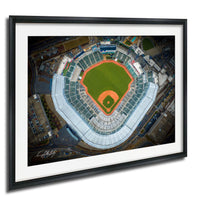 An aerial view of a baseball stadium, with the field, seating areas, and surrounding infrastructure clearly visible.