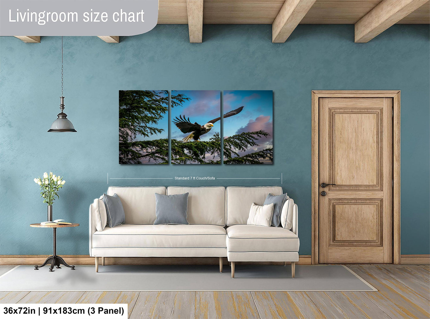 a living room with a couch and a painting on the wall