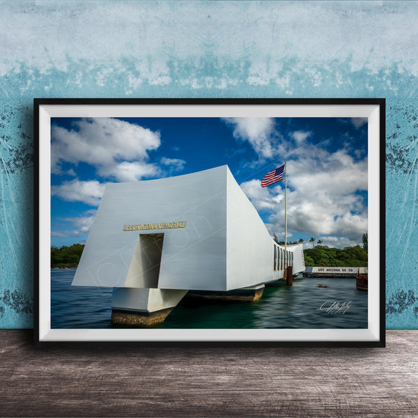 the memorial at Pearl Harbor, Hawaii, with the American flag flying in the background.