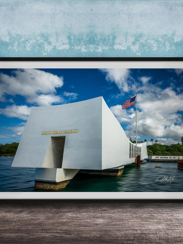 the memorial at Pearl Harbor, Hawaii, with the American flag flying in the background.