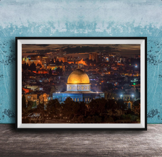 a cityscape at night, with a large dome-shaped building illuminated in the center. The city is filled with numerous buildings and structures, creating a vibrant and bustling urban atmosphere.