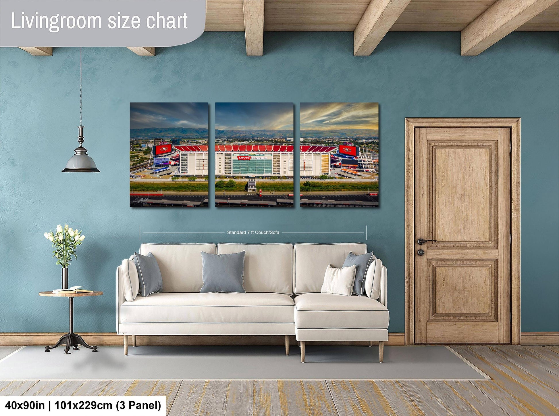 The image is a livingroom size chart that features a triptych of a stadium, with the left panel showing the stadium's exterior, the middle panel depicting the stadium's interior, and the right panel showing the stadium's exterior. The livingroom has a white sofa, a wooden door, and a potted plant, creating a cozy and inviting atmosphere.