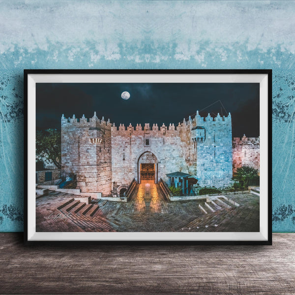 a castle with a moonlit night scene, featuring a large archway leading to a tower.