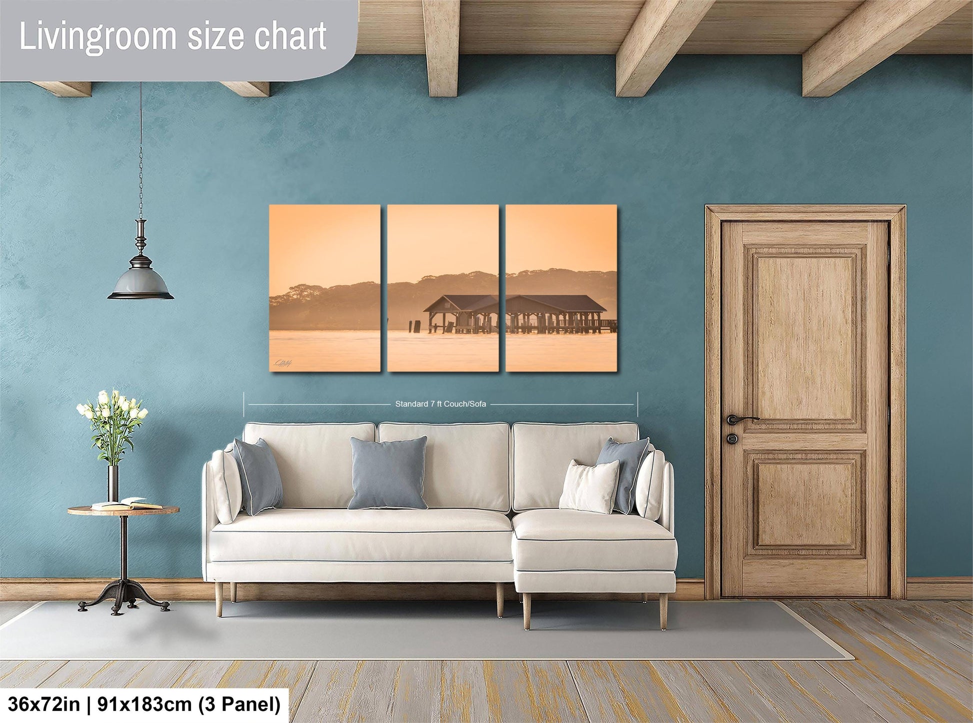The image is a living room with a white sofa, a wooden door, and a wall with a large living room size chart. The chart provides dimensions for the living room, including the width and height.