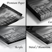 four different views of a black and white photograph of a building, with each view labeled as either "Premium Paper", "Canvas Wrap", "Acrylic", or "Metal/Aluminum".
