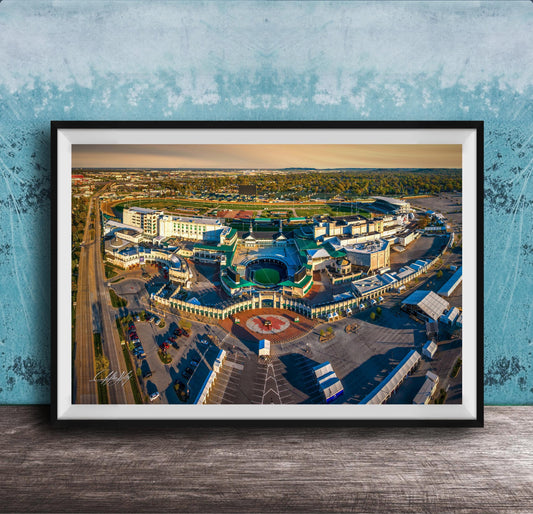 An aerial view of a large, multi-purpose complex with various buildings, roads, and parking areas.