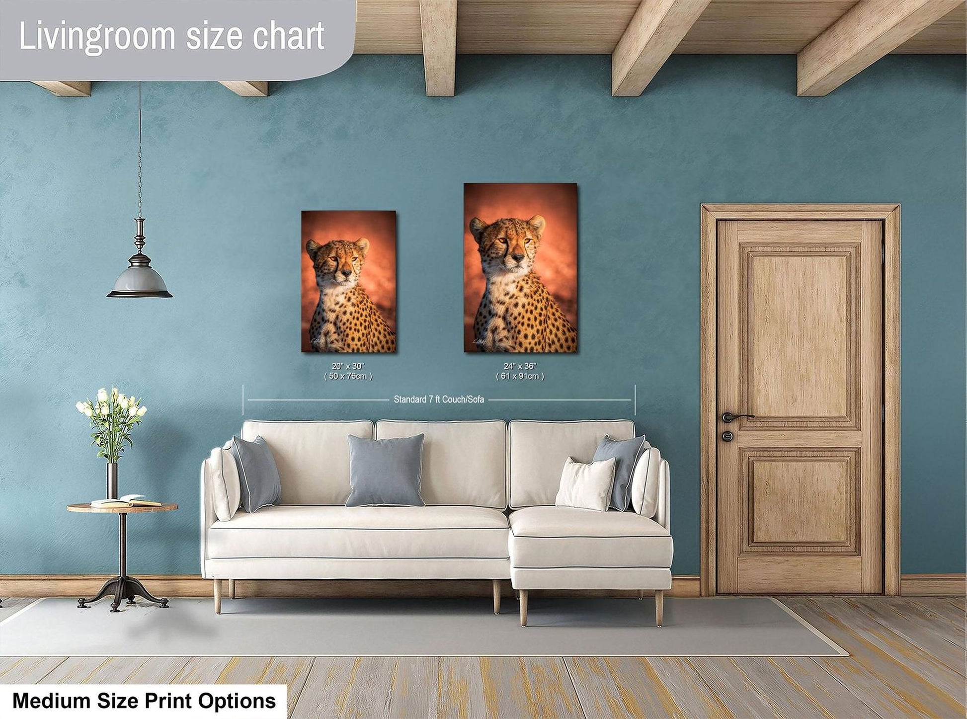 a living room with a white sofa, a wooden door, and a framed image of a cheetah on the wall.