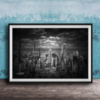A black and white photograph of a cityscape, likely New York, with numerous tall buildings and skyscrapers in the background.