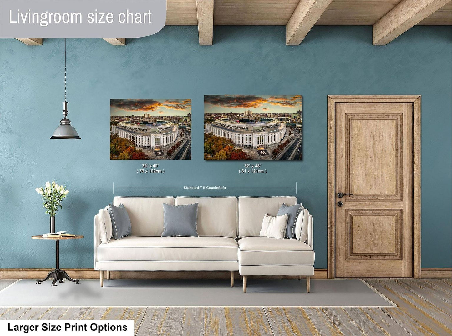 a living room with a white sofa and a wooden door. Above the sofa, there are two framed pictures of a stadium, likely the Washington Monument, hanging on the wall. The living room has a blue wall and a wooden ceiling.