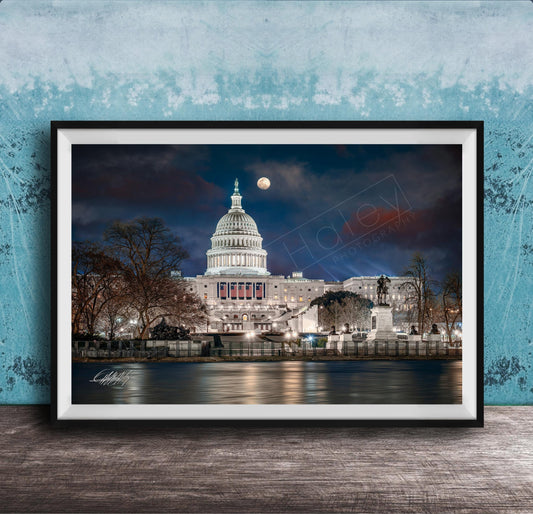the United States Capitol building at night, with the moon visible in the sky.