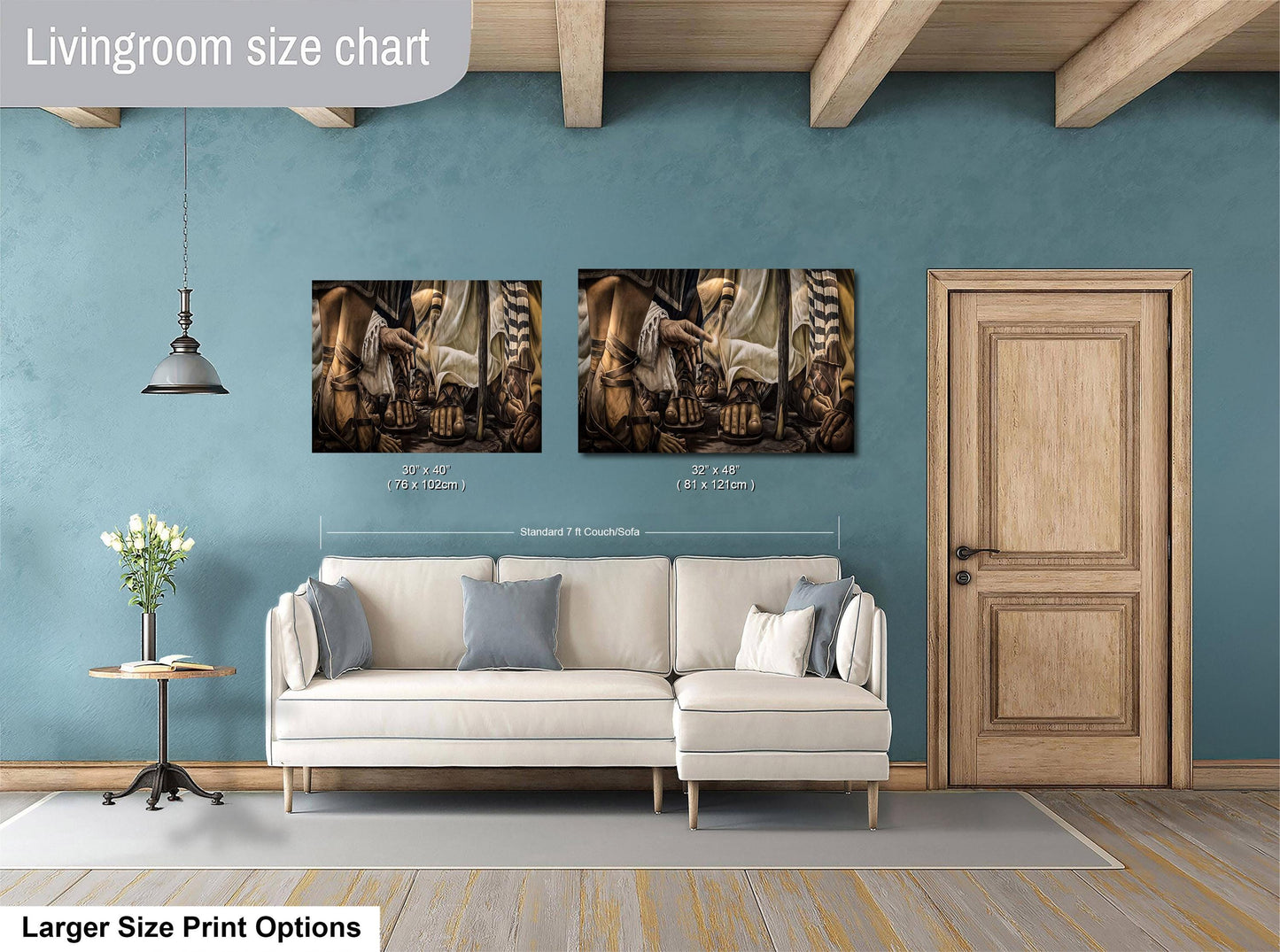 a living room with a white sofa, a wooden door, and two framed paintings hanging on the wall.