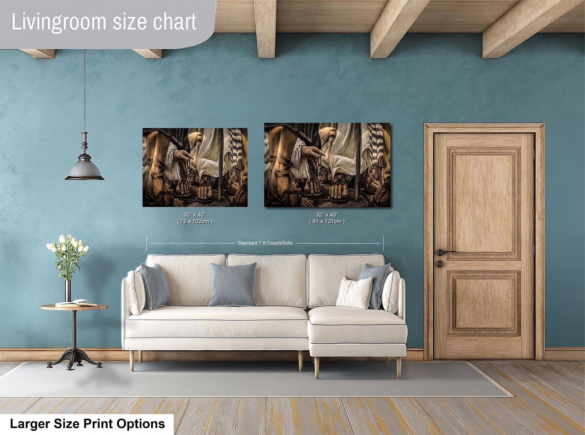a living room with a white sofa, a wooden door, and two framed paintings hanging on the wall.
