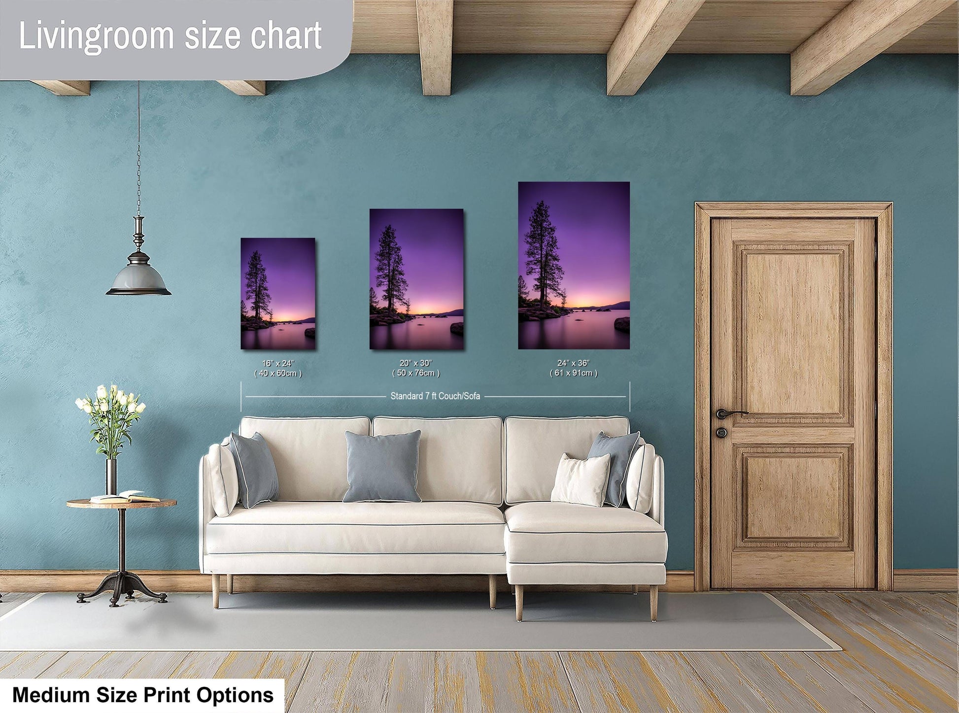 a living room with a white sofa and a wooden door. There are three framed pictures of trees hanging on the wall, and the room has a blue wall. The living room size chart indicates that the sofa is approximately 7 feet long and the door is around 7 feet tall.