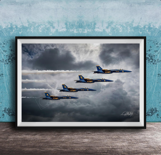 four blue and yellow fighter jets flying in formation against a cloudy sky.