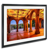a grand, ornate building with arched doorways and columns, illuminated by warm lighting that creates a cozy and inviting atmosphere.