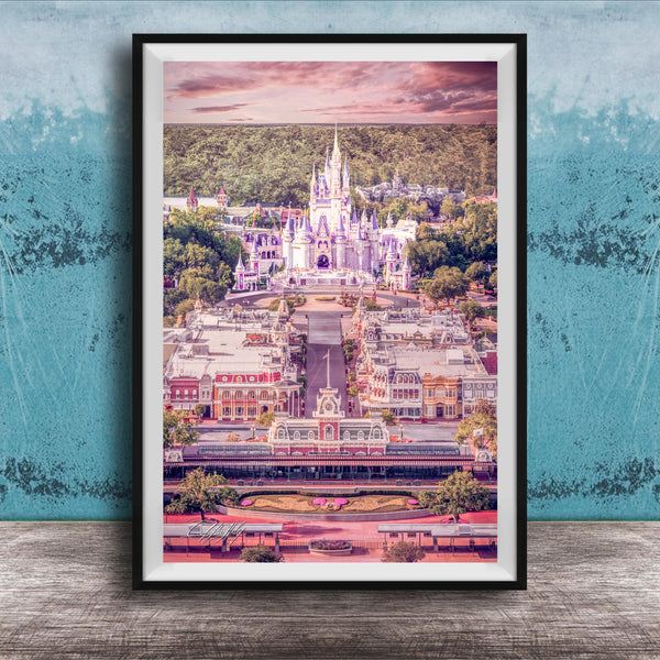 A framed image depicting a fantastical castle-like structure surrounded by a colorful, whimsical landscape, with a cloudy sky in the background.