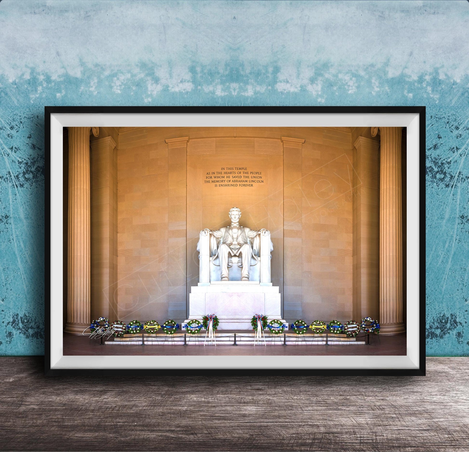 This fine art photograph captures the Lincoln Memorial in Washington DC during the quiet beauty of sunrise. The iconic marble statue of Abraham Lincoln sits beneath the powerful inscription honoring the president who preserved the Union. With soft morning light illuminating the historic monument and ceremonial wreaths placed along the base, this image celebrates one of America’s most meaningful landmarks. Perfect for collectors of Washington DC photography, presidential history artwork