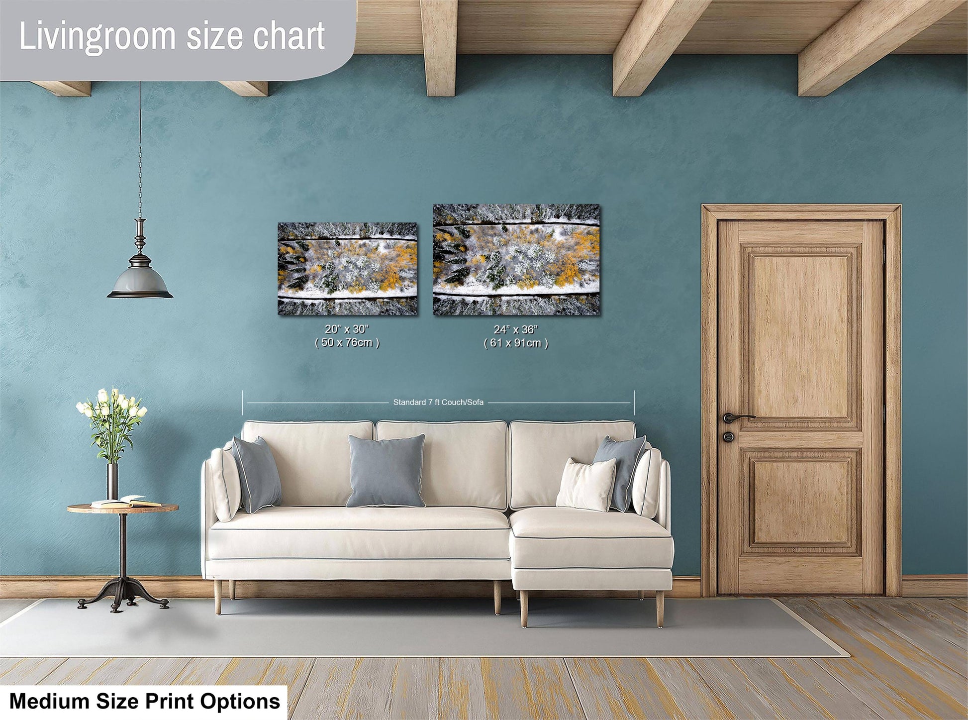 a living room with a white sofa, a wooden door, and a painting on the wall. The living room has a blue wall and a wooden floor.