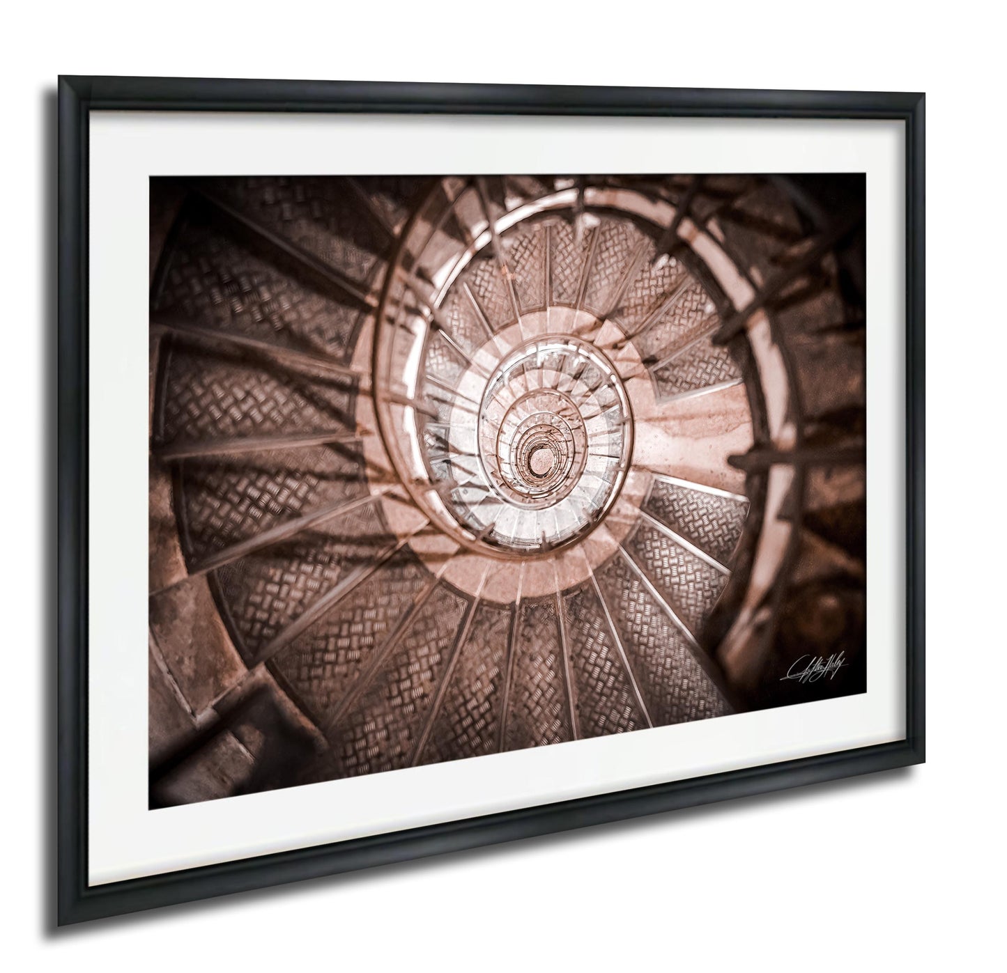 The image is a spiral staircase with a repeating pattern of steps, creating a visually striking and intricate design.